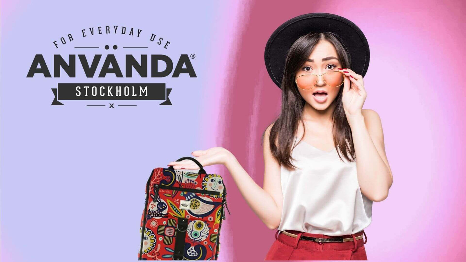 A woman holding a colorful bag